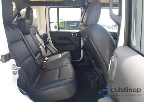 2024 Jeep Wrangler 4-Door Sahara 4X4 from USA, damaged, VIN 1C4PJXEG9RW322835